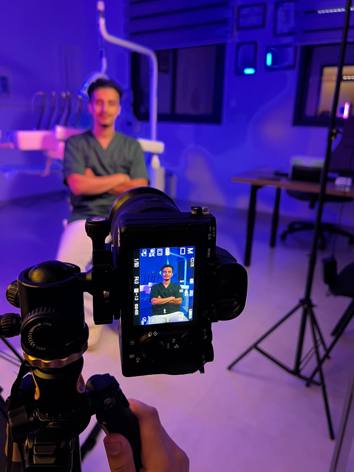Camera filming a dentist in the treatment room
